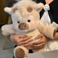 Vitello che corre in peluche